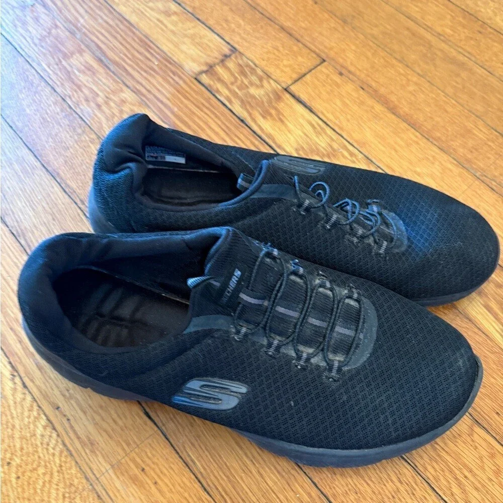 Skechers women’s Black Slip-On Mesh Walking Shoes